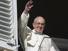  Pope Francis waves during the Angelus address in St. Peter's Square on November 22, 2015. 