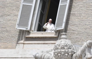 Pope Francis waves from a window of the apostolic palace May 10, 2020.   Vatican Media.
