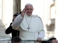 Pope Francis waves to pilgrims during his April 12, 2017, general audience in St. Peter's Square. 