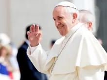Pope Francis waves to pilgrims during his June 6, 2018 general audience. 