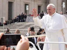 Pope Francis waves to pilgrims during his March 15, 2017 general audience in St. Peter's Square. 