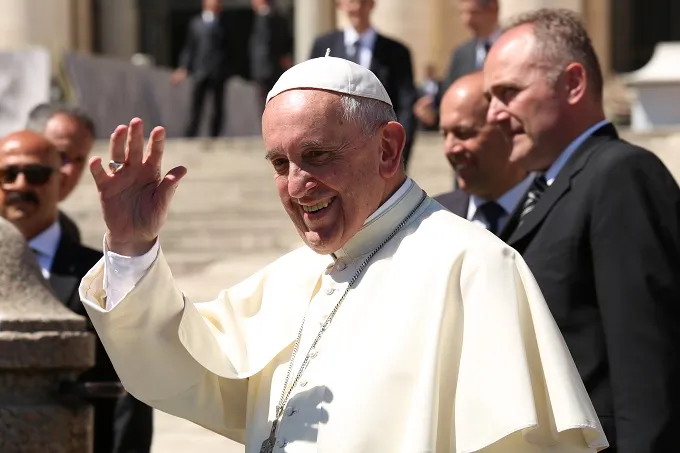 Pope Francis waves to pilgrims in St. Peter's Square during his April 20, 2016, general audience. ?w=200&h=150