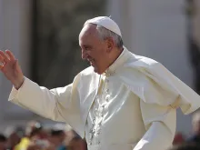 Pope Francis waves to pilgrims in St. Peter's Square on Sept. 9, 2015 for the general audience.