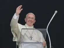 Pope Francis waves to the crowd gathered in St. Peter's Square June 15 before the angelus. 