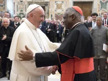 Pope Francis with Cardinal Peter Turkson, prefect of the Dicastery for Promoting Integral Human Development, in the Vatican, Nov. 10, 2017.