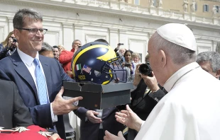 Pope Francis with Michigan Wolverine's football coach Jim Harbaugh in Vatican City, April 26, 2017.   L'Osservatore Romano.