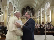 Pope Francis embraces Eugenio Bernardini, a Waldensian pastor, at the community's church in Turin, July 22, 2015. 