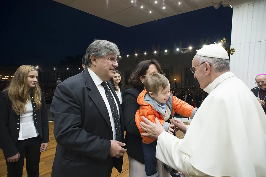 Pope Francis greets a family at a prayer vigil for the Synod on the Family, Oct. 3, 2015. ?w=200&h=150