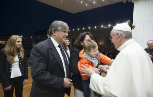 Pope Francis greets a family at a prayer vigil for the Synod on the Family, Oct. 3, 2015.   L'Osservatore Romano.