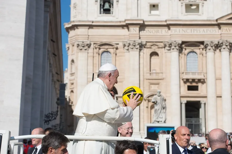 Pope Francis holds a soccer ball in St. Peter's Square in 2015. ?w=200&h=150