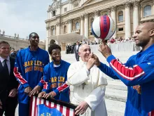 Pope Francis with the Harlem Globetrotters at the Wednesday general audience in St. Peter's Square, May 6, 2015. 