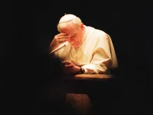 St. John Paul II in prayer, c. 1991. 