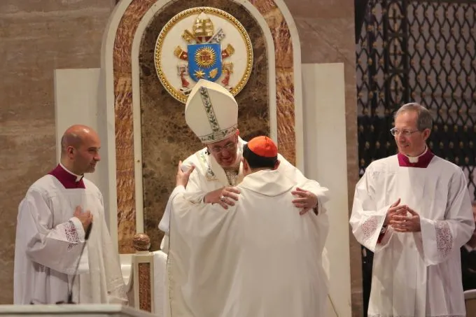 Pope Francis and Cardinal Luis Antonio Tagle embrace at the close of Mass Jan. 16 in Manila. ?w=200&h=150