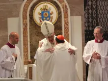 Pope Francis and Cardinal Luis Antonio Tagle embrace at the close of Mass Jan. 16 in Manila. 