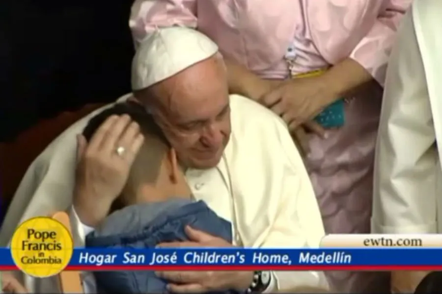 Pope Francis embraces a child at the St. Joseph Children's Home in Medellin, Colombia Sept. 9, 2017.?w=200&h=150