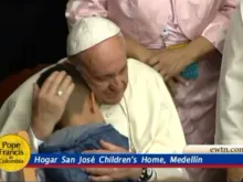 Pope Francis embraces a child at the St. Joseph Children's Home in Medellin, Colombia Sept. 9, 2017.