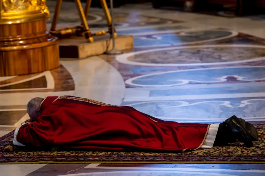 Pope Francis prostrates himself before the altar of St. Peter's Basilica at the opening of the Good Friday liturgy April 19, 2019. ?w=200&h=150