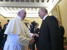 Pope Francis greets Russian President Vladimir July 4, 2019. 