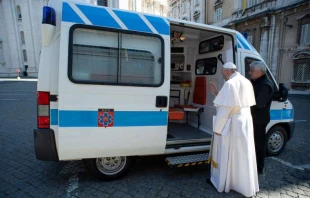 Pope Francis blesses an ambulance entrusted to the Office of Papal Charities.   Vatican Media.