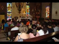 Portuguese youth attend Mass at a parish in Almedinilla. ?w=200&h=150