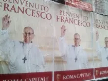 Posters welcoming Pope Francis are spreading across Rome as the city prepares for the newly elected Pope's inauguration on March 19, 2013. 