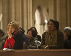 Catholics praying at Mass. ?w=200&h=150