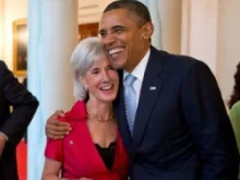 President Barack Obama laughs with HHS Sec. Kathleen Sebelius in the Grand Foyer of the White House, July 26, 2012. 