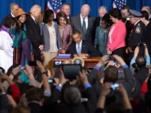 President Obama signs S. 47, the Violence Against Women Reauthorization Act of 2013, at the U.S. Dept. of Interior on March 7, 2013. Official White House Photo by Chuck Kennedy.