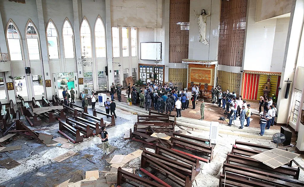 An inspection of Our Lady of Mount Carmel Cathedral in Jolo, Philippines, Jan. 28, 2019, a day after suicide bombs exploded at the church. ?w=200&h=150