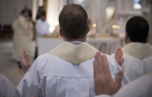 Priests celebrate Mass at the Cathedral of the Immaculate Conception in Denver, Jan. 17, 2015.   Catholic Charities/Jeffrey Bruno (CC BY 2.0)