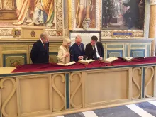 Charles, Prince of Wales, and Camilla, Duchess of Cornwall, examine books at the Vatican Library, April 4, 2017. Photo courtesy of Clarence House.