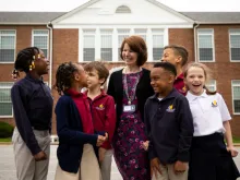 Principal Claire Dant with students at Bethel Christian Academy in Savage, Md. 