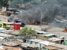 Pro-Gbagbo forces break up protests in Abidjan in February 2011.  