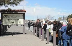 Pro-life advocates pray with a statue of Our Lady of Fatima in front of the Planned Parenthood Surgical Center in Albuquerque, March 20, 2013. ?w=200&h=150