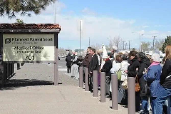 Pro life advocates pray with a statue of Our Lady of Fatima in front of the Planned Parenthood Surgical Center in Albuquerque March 20 2013 Credt Rose Marie Nalburg CNA