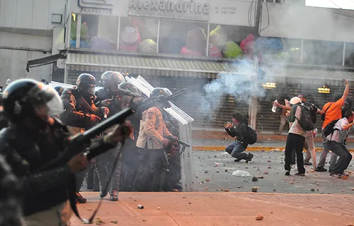   Protesters are met by riot police on Feb. 15, 2014 in Altamira, Caracas, Venezuela. ?w=200&h=150