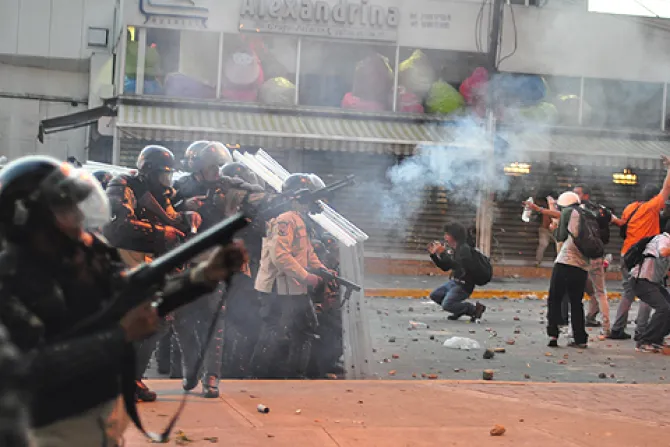 Protesters are met by riot police on Feb 15 2014 in Altamira Caracas Venezuela  Credit andresAzp via Flickr CC BY ND 20 CNA 2 21 14