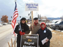 Protesters stand outside of All Families Healthcare abortion clinic, Kalispell, Mont. 