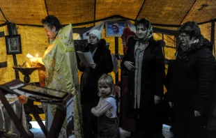 A Divine Liturgy of the Ukrainian Greek Catholic Church celebrated during protests in Kyiv earlier this month. Jakub Szymczuk/GOSC NIEDZIELNY. Courtesy of Aid to the Church in Need.