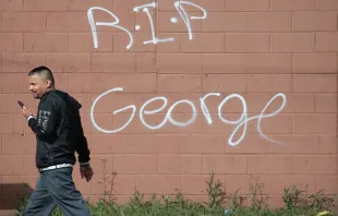 RIP George has been painted on a wall after a night of protests and violence on May 29, 2020 in Minneapolis, Minnesota.   Scott Olson/Getty Images.