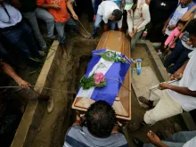 Relatives and friends of 16-year old Matt Romero attend his burial in Managua, Sept. 24, 2018. 