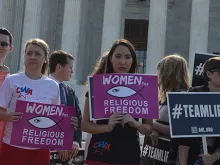 Religious Liberty supporters outside the U.S. Supreme Court building in Washington D.C. June 26, 2014. 
