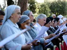 Religious sisters attend the enthronement of Our Lady of Charity in the Vatican Gardens, August 28, 2014. 