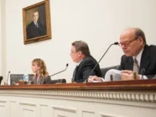 Rep Chris Smith (Center) listens during an Helsinki Commission hearing on sex trafficking and abuse of children, October 4, 2012.