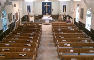Repairs on the walls of St. Virgilius Catholic Church in the Broad Channel neighborhood of Queens.   Fr. Richard Ahlemeyer.