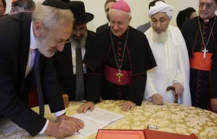 Representatives of the Abrahamic religions sign a declaration on end-of-life issues at the Vatican Oct. 28, 2019.   Vatican Media