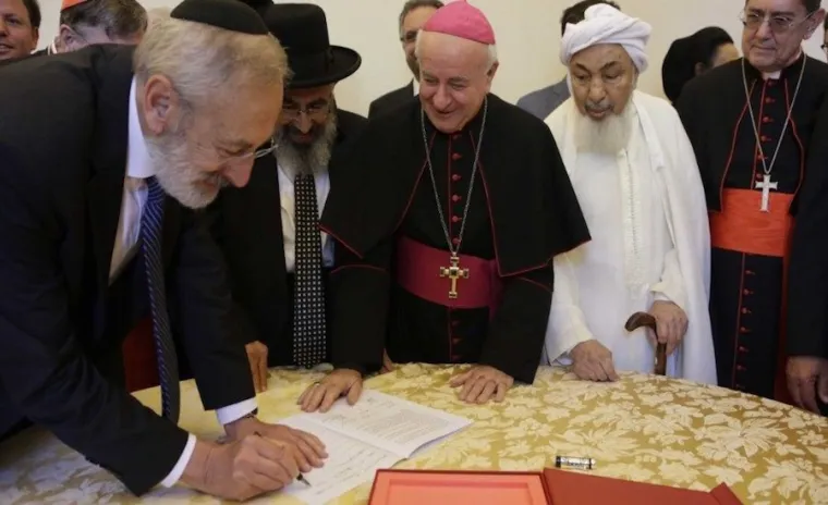 Representatives of the Abrahamic religions sign a declaration on end-of-life issues at the Vatican Oct. 28, 2019. Credit: Vatican Media