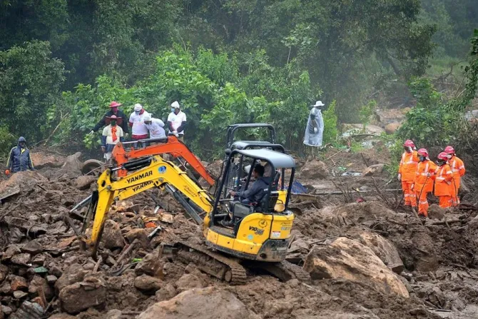 Rescue workers search for missing people at a landslide site in Kerala state Aug 10 2020 Credit STR  AFP via Getty Images