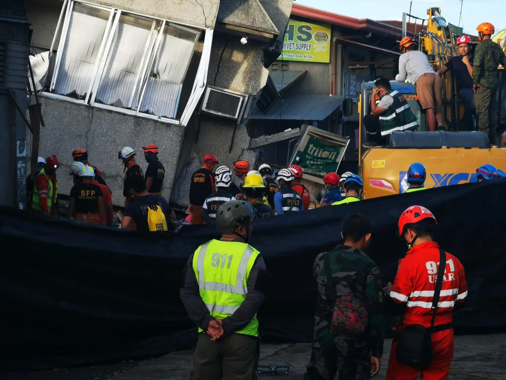Rescuers search for survivors after a 6.8-magnitude earthquake struck Padada town, Davao del Sur province in the Philippines, Dec. 16, 2019. ?w=200&h=150