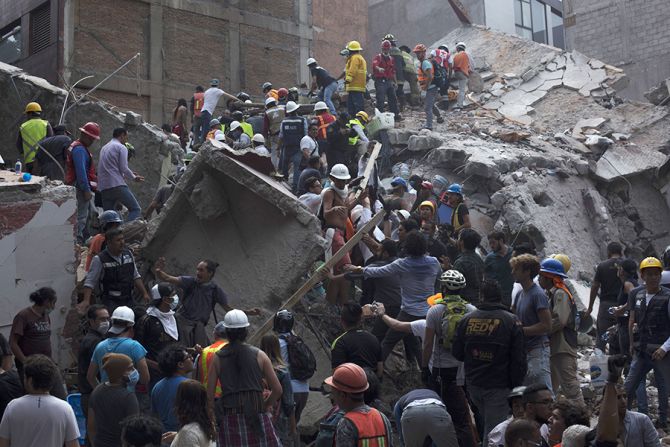 Rescuers work in the rubble after a magnitude 71 earthquake struck on September 19 2017 in Mexico City Mexico Credit Rafael S Fabres Getty Images CNA